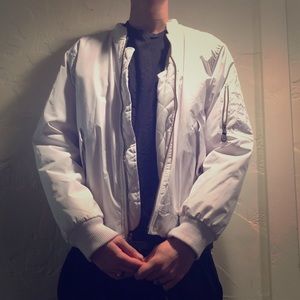 White bomber jacket.